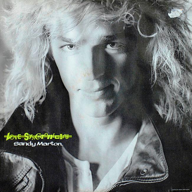 Now playing: Sandy Marton - Love Synchronicity